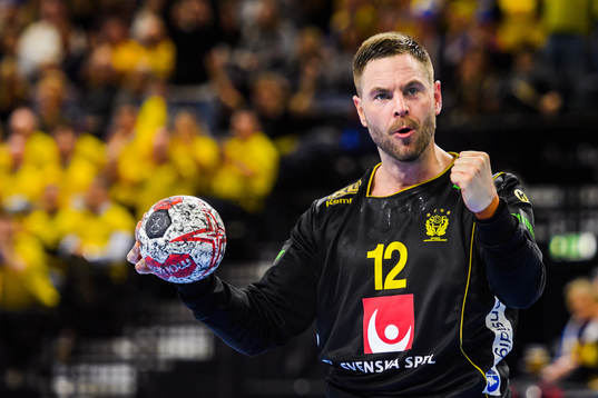 Goalkeeper Andreas Palicka of Sweden celebrates
