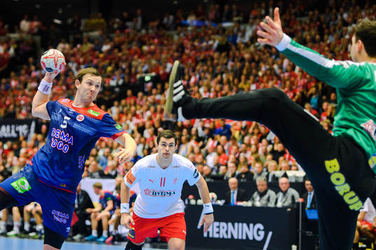 Sander Sagosen of Norway and Goalkeeper Niklas Landin of