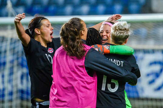 goalkeeper Stephanie Labbe of Canada celebrates
