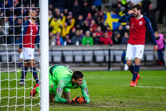 Goalkeeper Rune Almenning Jarstein of Norway looks dejected