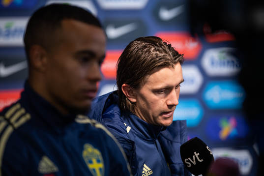 Kristoffer Olsson of Sweden talks to the media