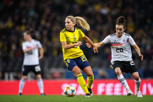 Elin Rubensson of Sweden and Lina Magull of Germany