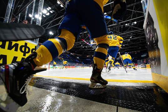 Players of Sweden enter the ice for warm-up