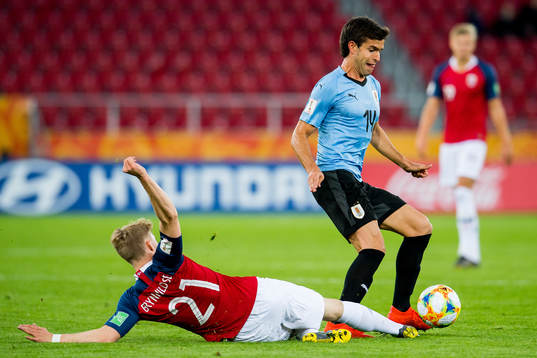 Ola Brynhildsen of Norway and Francisco Ginella of Uruguay