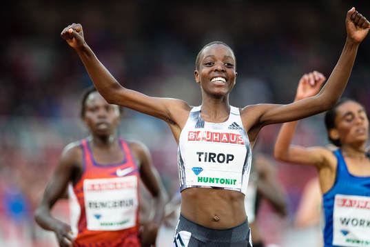 Agnes Jebet Tirop of Kenya celebrates