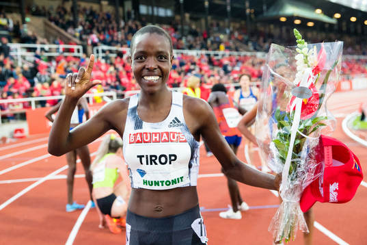 Agnes Jebet Tirop of Kenya celebrates