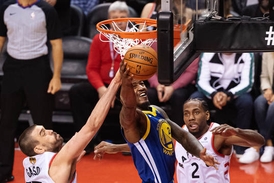 Warriors Jordan Bell in action against Raptors Marc Gasol