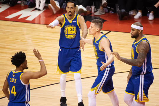 Warriors Jonas Jerebko celebrates with teammates