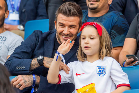 Former football player David Beckham with his daughter
