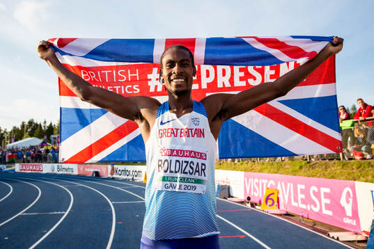 Shemar Boldizsar of Great Britain wins the men's 200m final