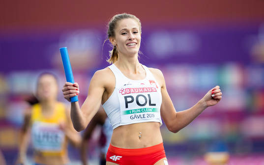 Natalia Kaczmarek of Poland crosses the finish line as gold