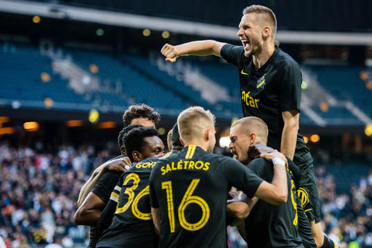 Karol Mets of AIK celebrates