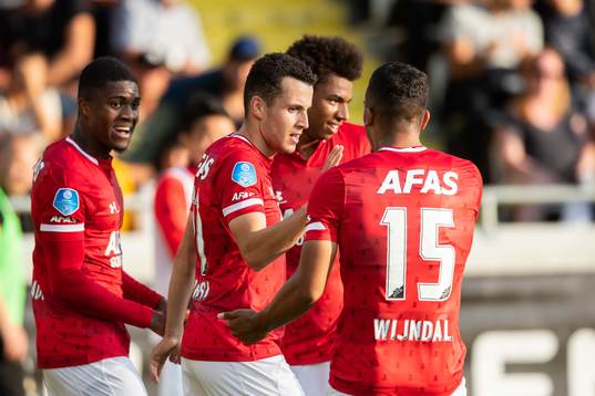 Oussama Idrissi of AZ Alkmaar celebrate with teammates