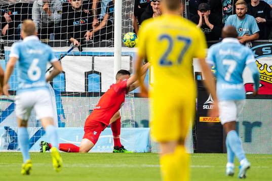 Shamar Nicholson of Domzale scores 0-1 behind goalkeeper