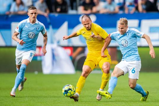 Oscar Lewicki of Malmö FF and Tonic Mujan of Domzale