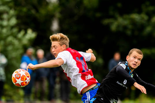 Tore André Hagbø Sørås of KFUM and Vegard Østraat