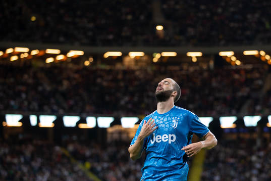 Gonzalo Higuain of Juventus looks dejected