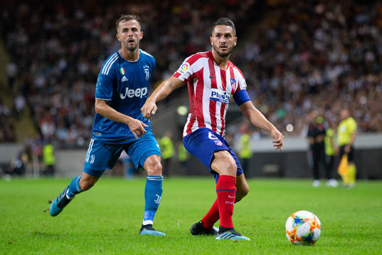 Miralem Pjanic of Juventus and Koke Jorge Resurreccion of