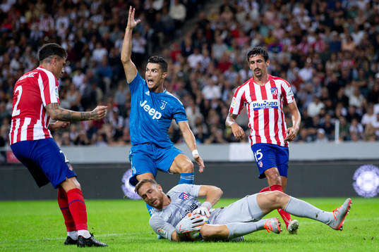 Cristiano Ronaldo of Juventus and goalkeeper Jan Oblak of
