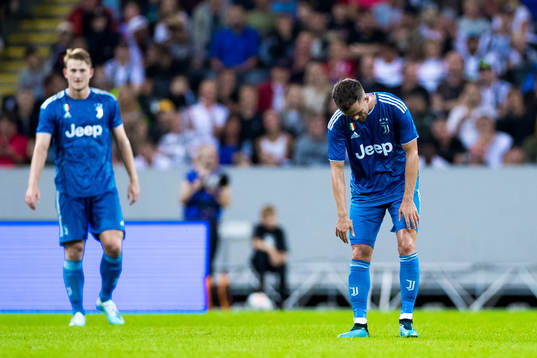 Miralem Pjanic of Juventus looks dejected