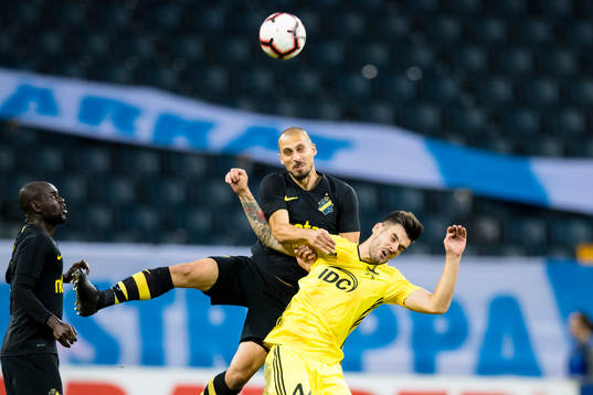 Panajotis Dimitriadis of AIK battles for the ball with