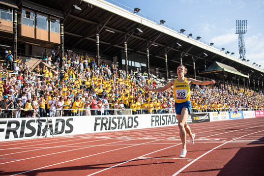 Andreas Almgren of Sweden celebrates as he crosses the