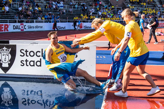 Kim Amb of Sweden celebrates his victory in men's javelin