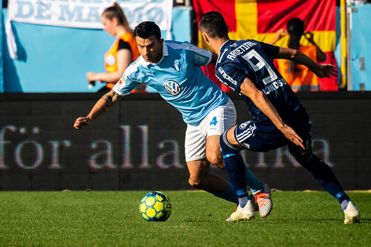 Djurgårdens Haris Radetinac och Malmö FFs Behrang Safari