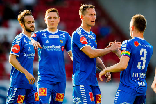 Morten Gamst Pedersen of Tromsø celebrates with teammate