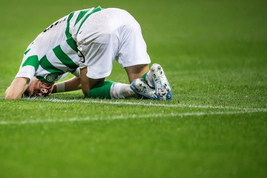 Michael Hohnston of Celtic in pain
