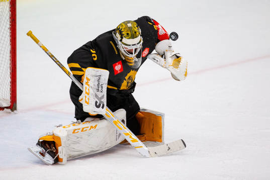 Goalie Gustaf Lindvall of Skellefteå saves