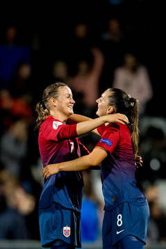 Kristine Minde and Vilde Bøe Risa of Norway celebrates