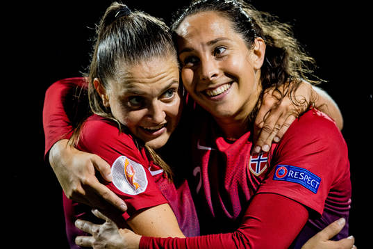 Vilde Bøe Risa and Ingrid Moe Wold of Norway celebrate
