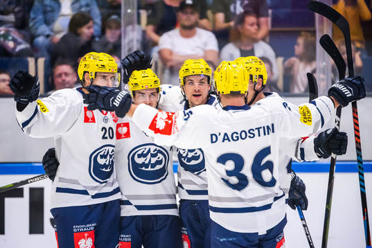 Nick Plastino of Ambri-Piotta celebrate with teammates