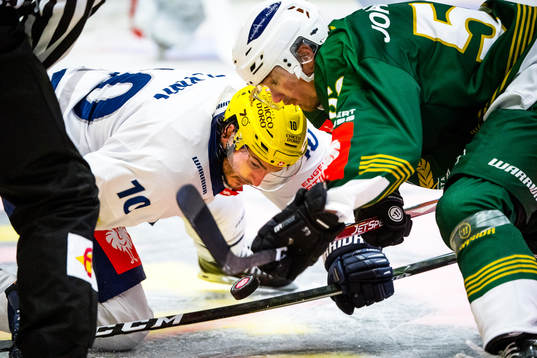 Brian Flynn of Ambri-Piotta and Linus Johansson of