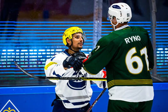 Isacco Dotti of Ambri-Piotta against Johan Ryno of