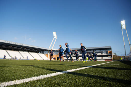 Players of the Swedish national football team warm up at