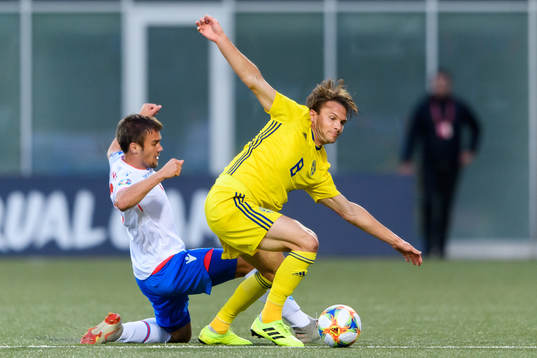 Hallur Hansson of Faroe Islands and Albin Ekdal of Sweden