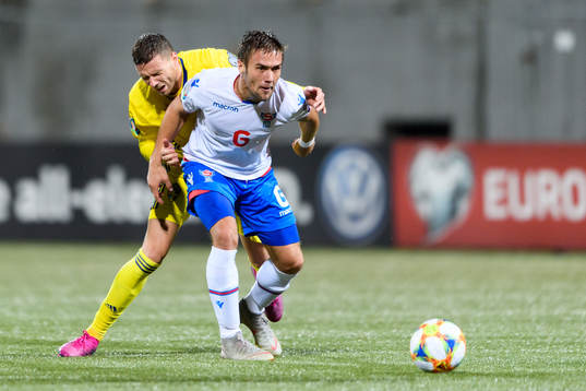 Marcus Berg of Sweden in a situation with Jakob Johansson