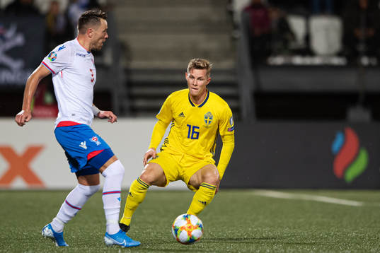 Viljormur Davidsen of Faroe Islands and Emil Krafth of