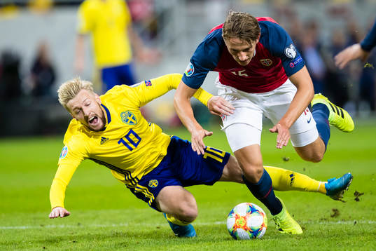 Emil Forsberg of Sweden battles for the ball with Sander
