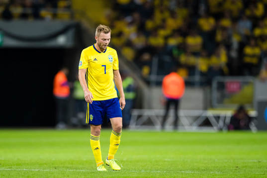 Sebastian Larsson of Sweden looks dejected