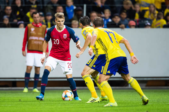 Martin Ødegaard of Norway against Albin Ekdal and Pierre