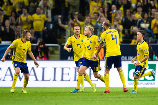 Emil Forsberg (M) celebrate with Sebastian Larsson, Pierre
