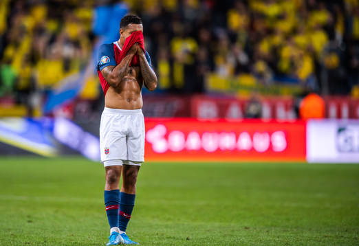 Joshua King of Norway looks dejected