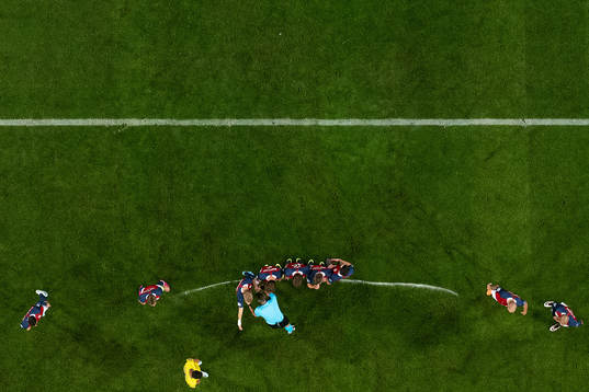 referee Slavko Vincic marks the free kick line