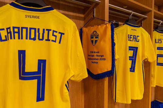 A commemorative banner between jerseys of Andreas Granqvist