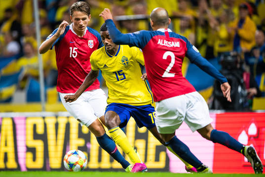 Alexander Isak of Sweden against Sander Berge an Haitam