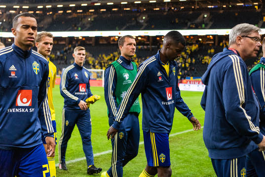 Robin Quaison and Alexander Isak of Sweden looks dejected
