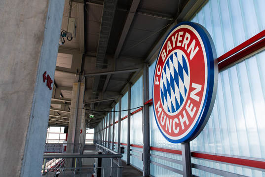 View of a club logo sign at the Bayern Munich Campus Arena